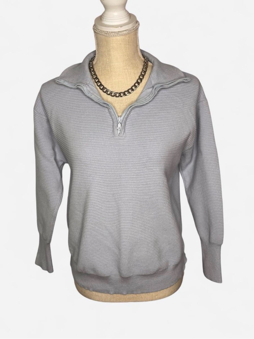 Light blue quarter zip sweatshirt with hood size: S